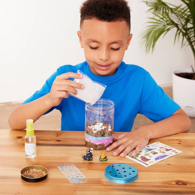 slide 6 of 8, Creativity for Kids Grow N' Glow Terrarium: Science Kit for Kids, Educational Toy, Includes Jar, Figures, Stickers, Rocks, 1 ct