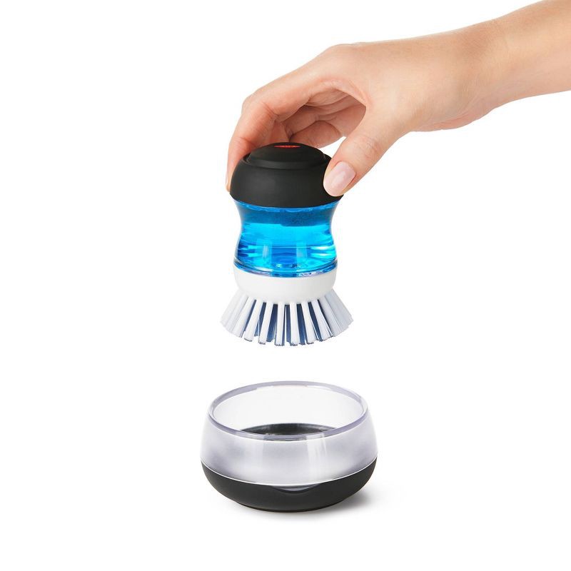 slide 2 of 3, OXO Soap Dispensing Palm Brush Storage Set: Nylon Scrub Brush for Multi-Surface Dish Cleaning, Reusable, Black, 1 ct