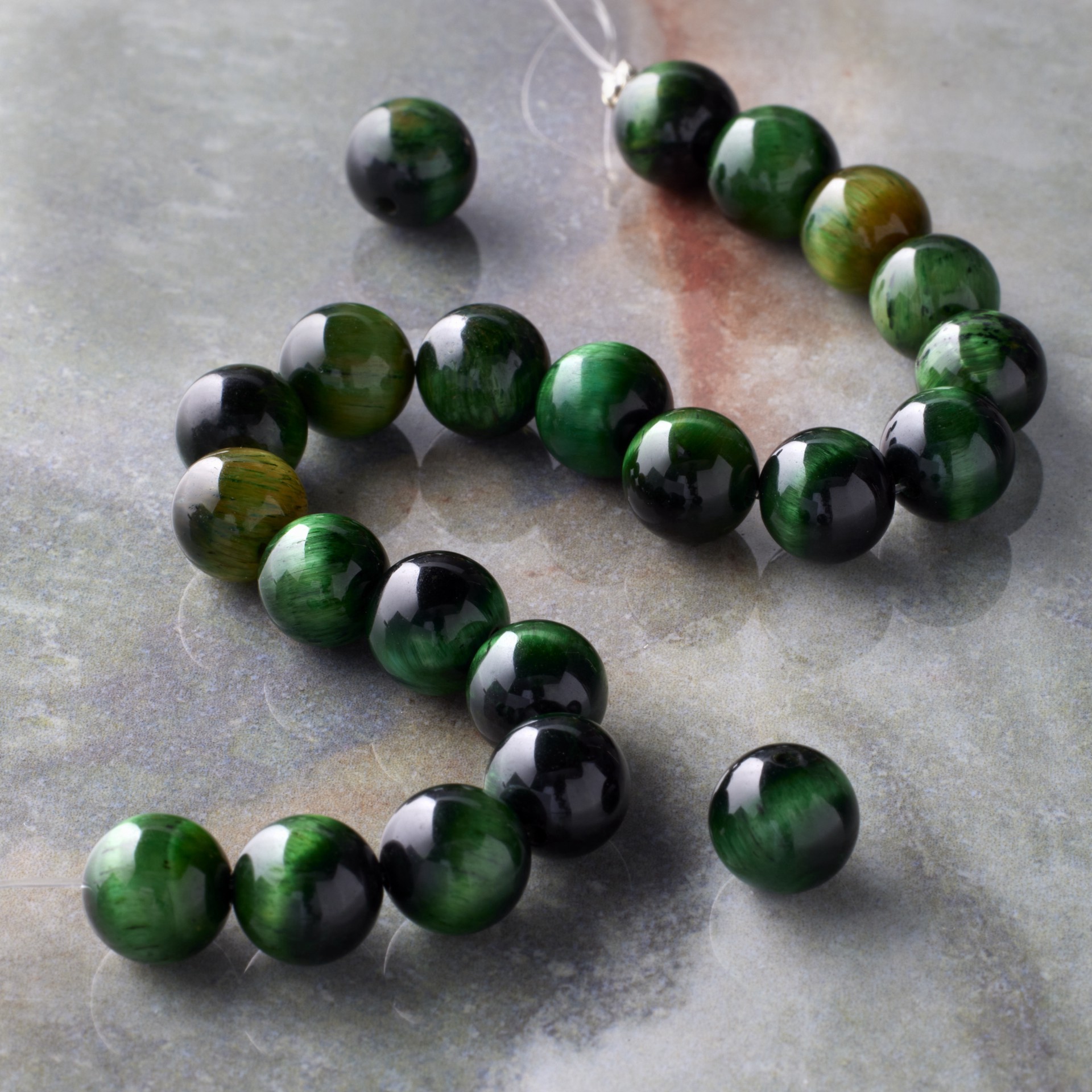 slide 2 of 3, Dark Green Dyed Tiger's Eye Round Beads, 8mm By Bead Landing, 8mm