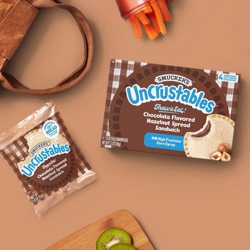 slide 3 of 10, Smucker's Uncrustables Chocolate Flavored Hazelnut Spread Frozen Sandwich - 7.2oz/4ct, 4 ct; 7.2 oz