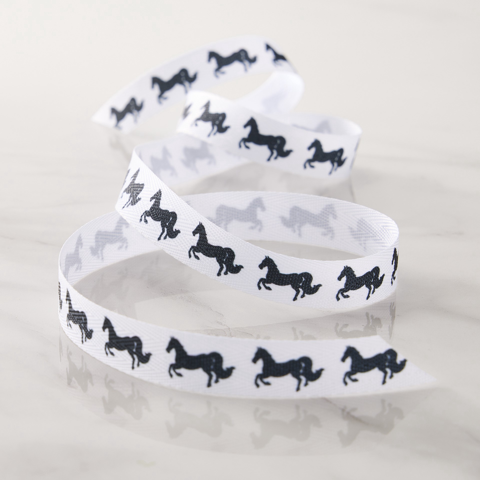 slide 2 of 2, 5/8" X 7yd. Black & White Horses Faux Linen Ribbon By Celebrate It Classic, 5/8 in x 7 yd
