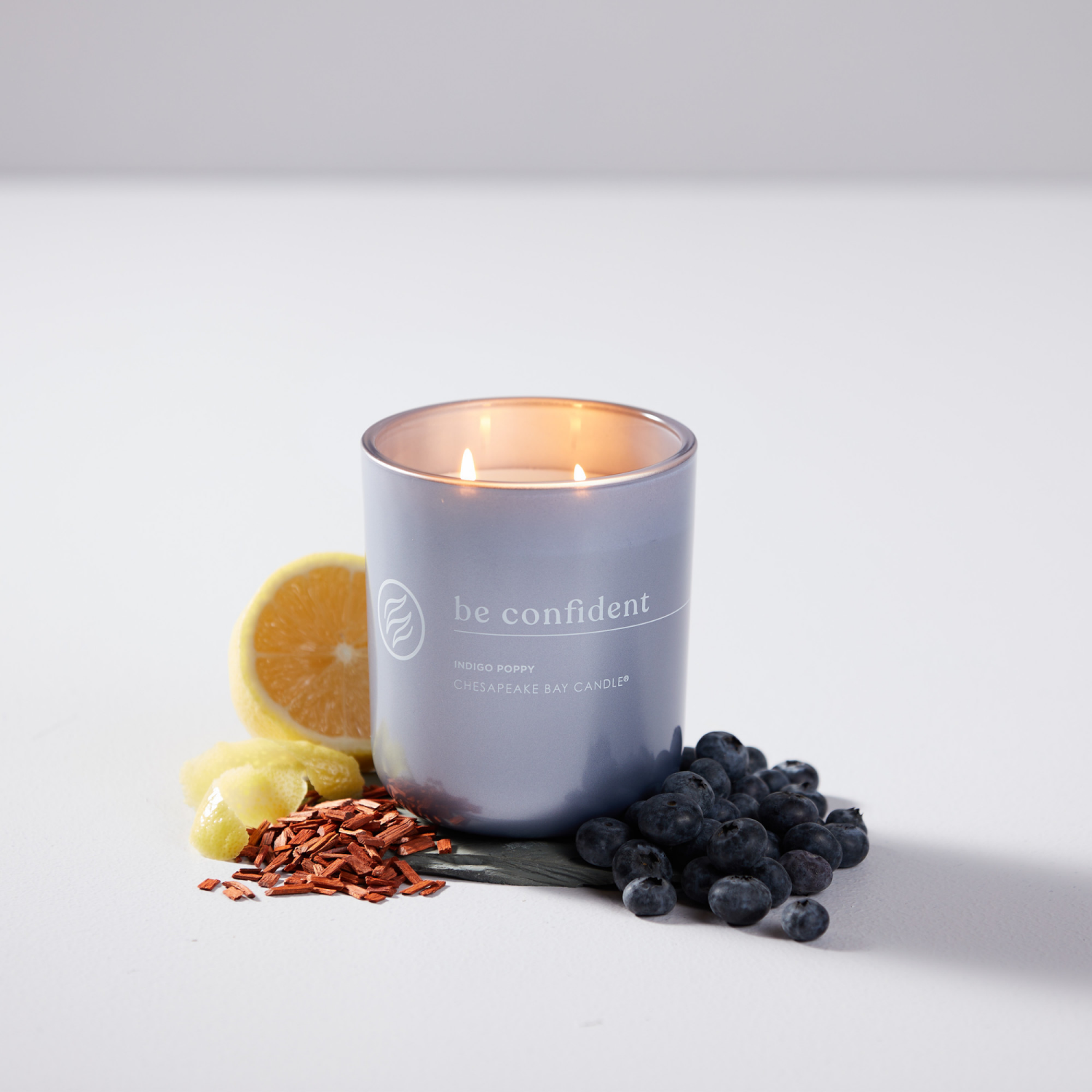 slide 5 of 7, Chesapeake Bay Candle Intentions Collection Be Confident - Indigo Poppy, 12 oz