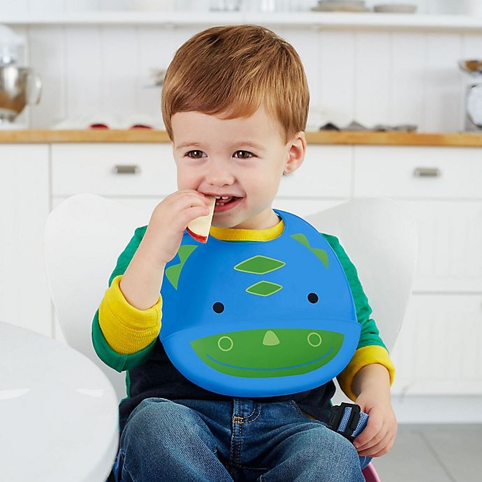 slide 3 of 3, Skip Hop SKIP*HOP Dino ZOO Tuck-Away Silicone Bib, 1 ct