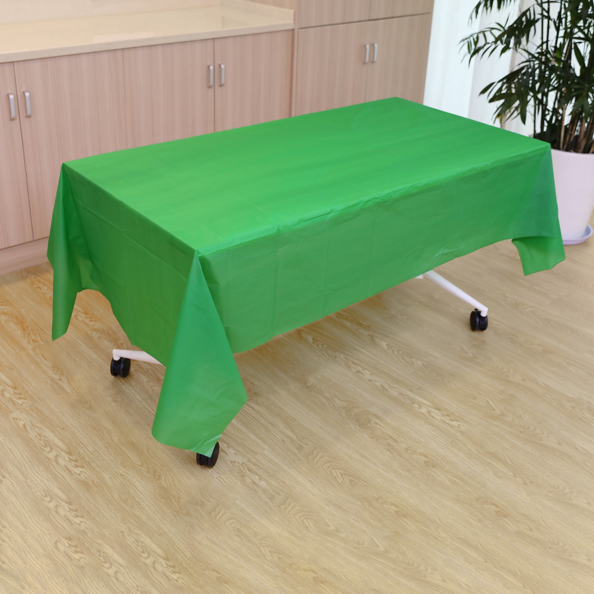 slide 2 of 3, 54" X 108" Sports Green Plastic Table Cover By Celebrate It, 54 in x 108 in