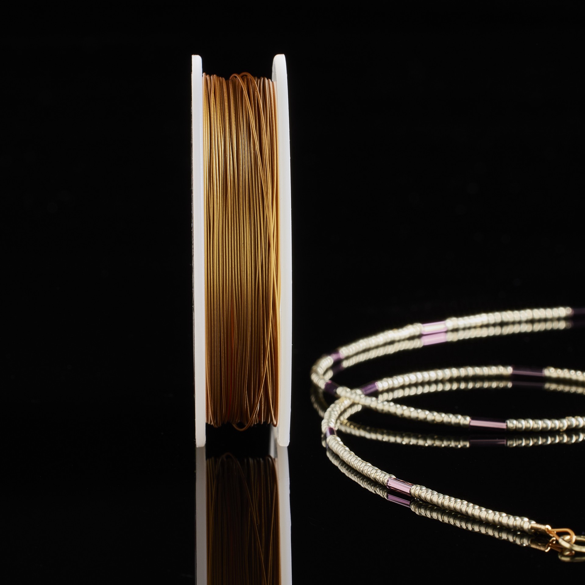 slide 2 of 2, Beadalon 7 Strand Satin Gold Bead Stringing Wire, 45 ft