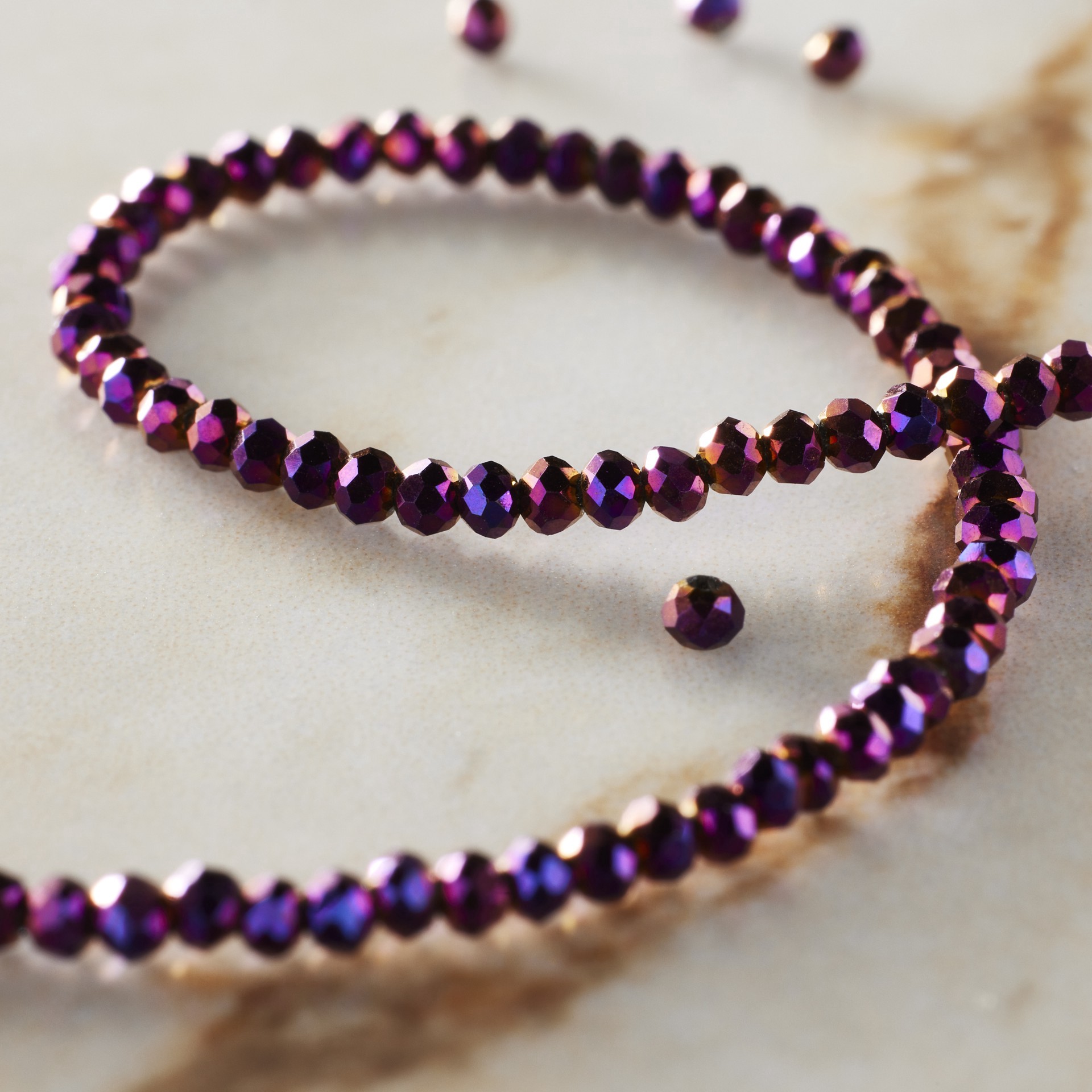 slide 2 of 3, Purple Faceted Round Beads, 2mm By Bead Landing, 2mm