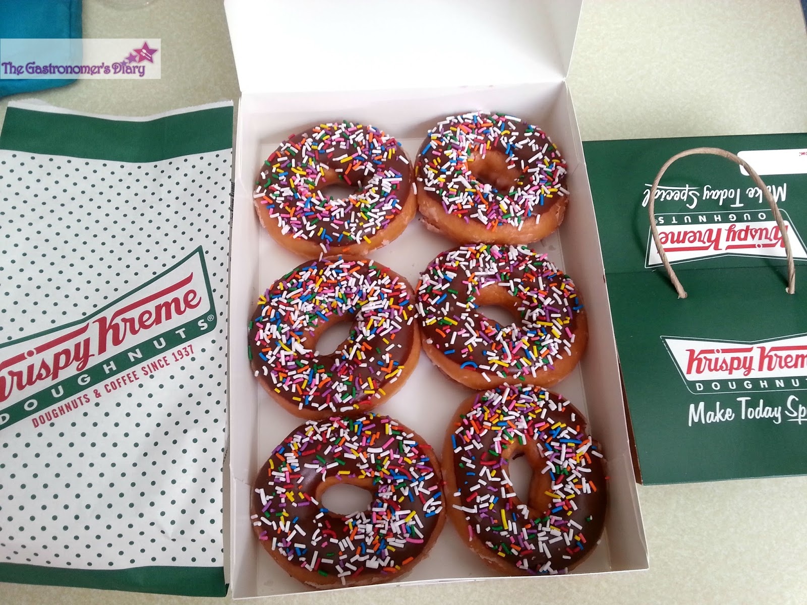 slide 1 of 1, Krispy Kreme Half Dozen Sprinkled Donuts, 6 ct