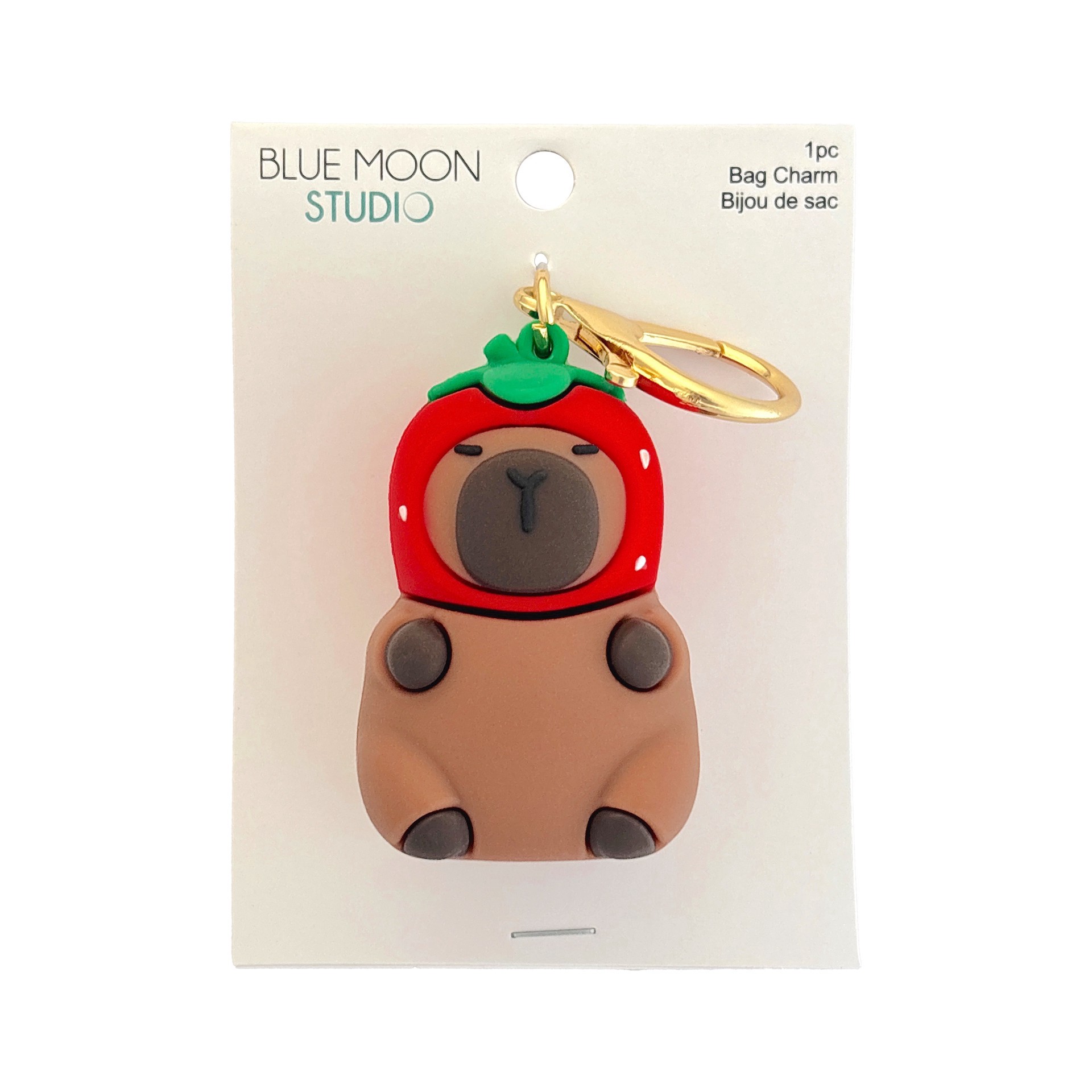 slide 2 of 3, Blue Moon Studio Capybara In Strawberry Hat Bag Charm, 2.25 in x 1.42 in