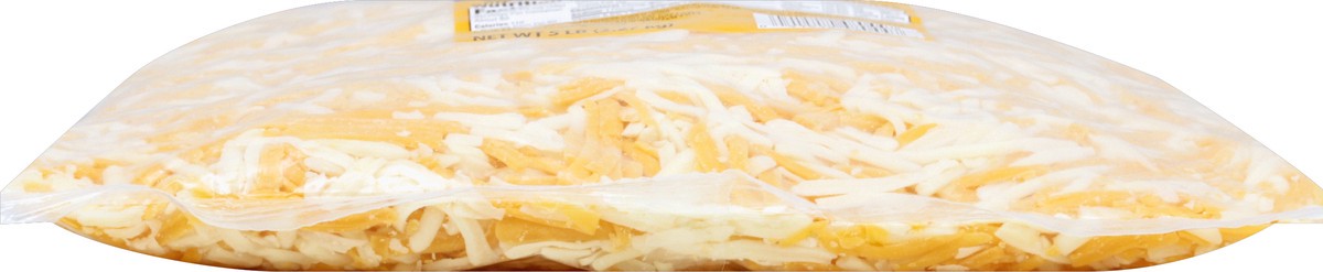 slide 3 of 6, First Street Shredded Cheddar Jack Cheese, 5 lb