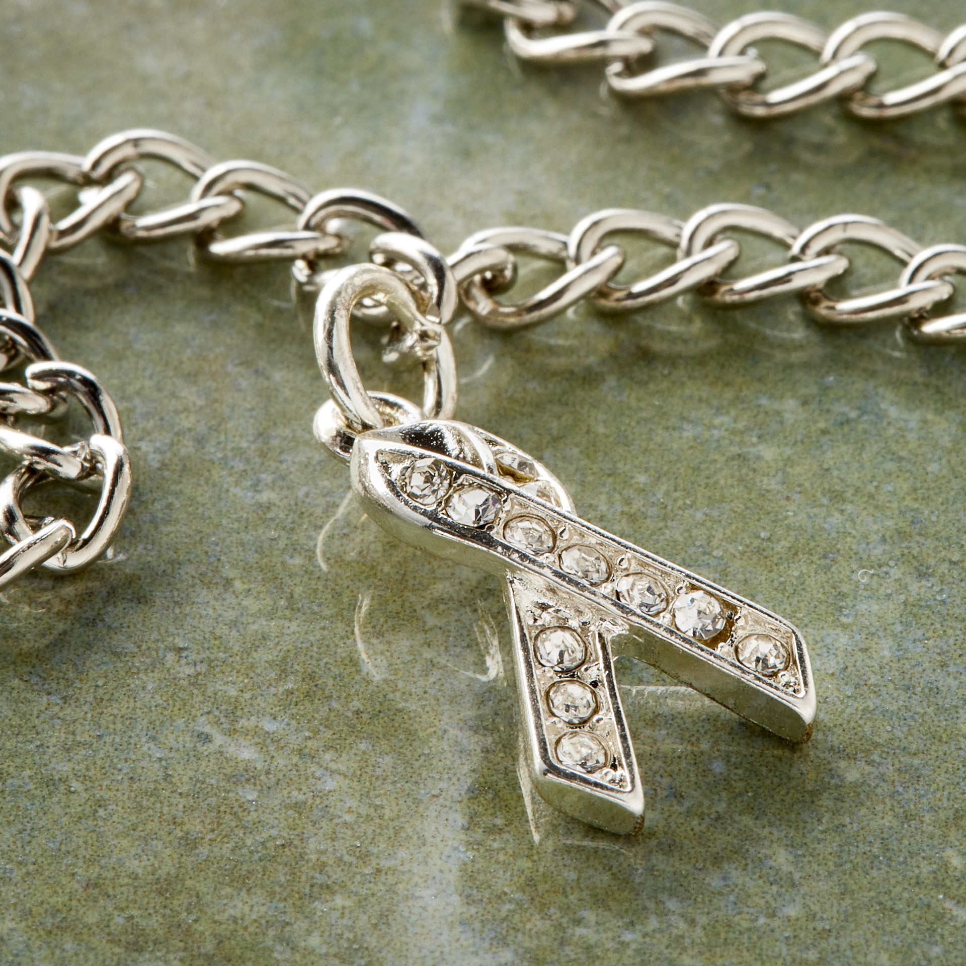 slide 4 of 4, Charmalong Silver Plated & Stone Paved Ribbon Charm By Bead Landing, 0.75 in x 0.4 in x 0.25 in