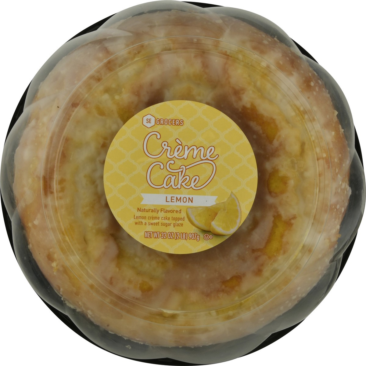 slide 1 of 14, SE Grocers Lemon Creme Cake, 32 oz