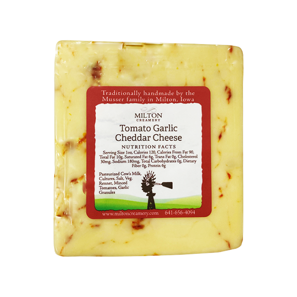 slide 1 of 1, Miltoncrea Milton Creamery Tomato Garlic Cheddar Cheese, per lb
