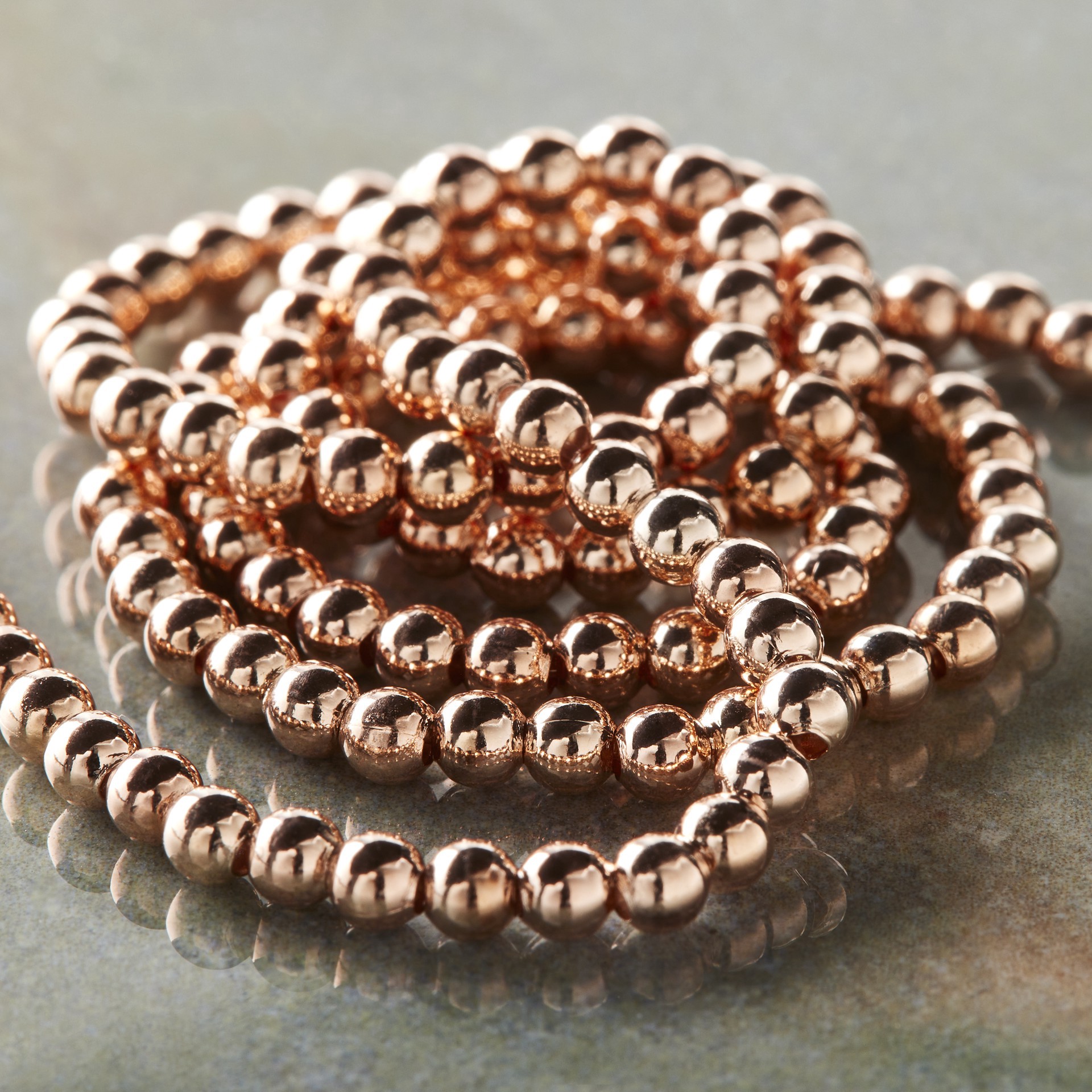 slide 3 of 3, Rose Gold Copper Small Round Beads, 3mm By Bead Landing, 3 mm
