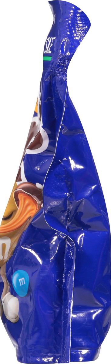 slide 9 of 13, M&M's Caramel Chocolate Candies Family Size 17.24 oz, 17.24 oz