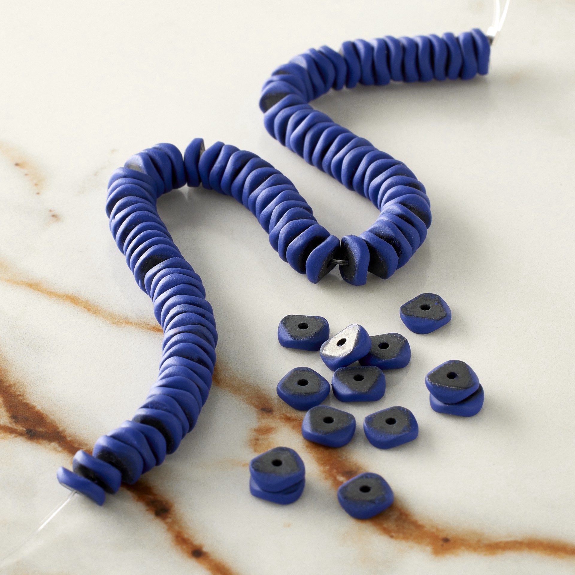 slide 3 of 3, Blue Painted Reconstituted Hematite Wave Heishi Beads, 5.8mm By Bead Landing, 5.8mm