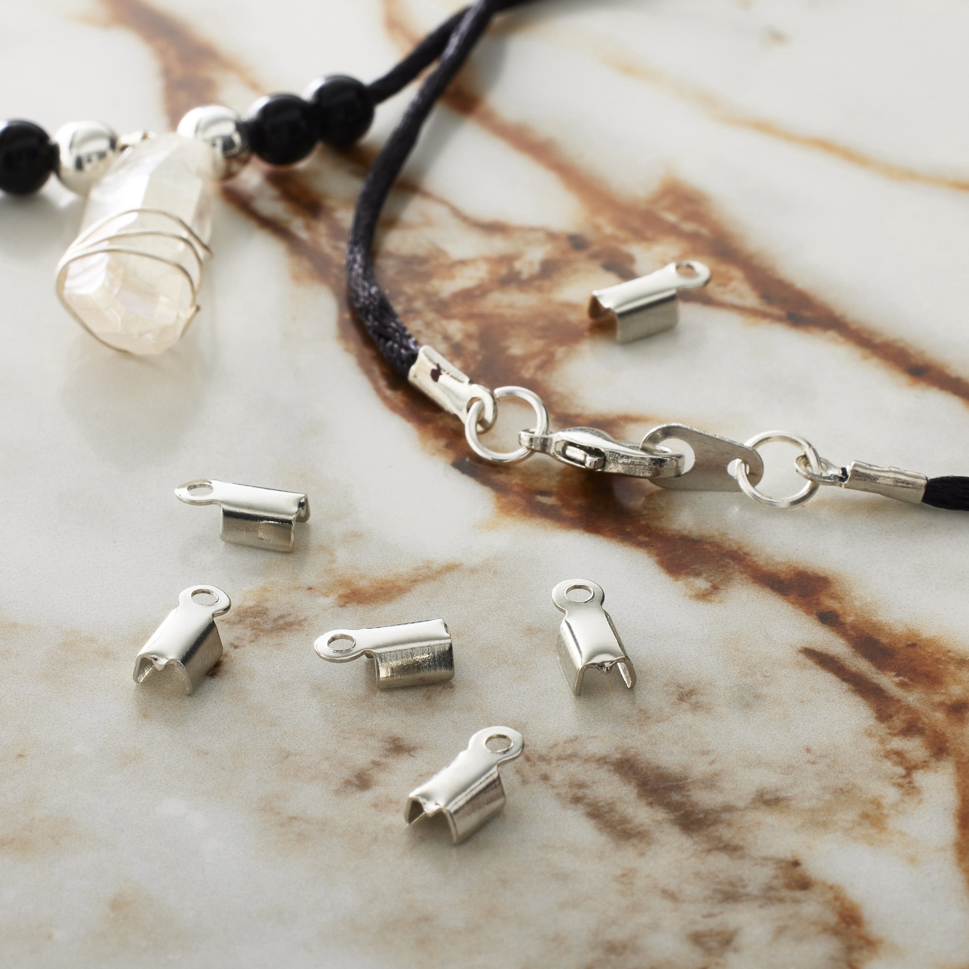 slide 2 of 4, 10mm Rhodium Crimps With Loop By Bead Landing, 10mm