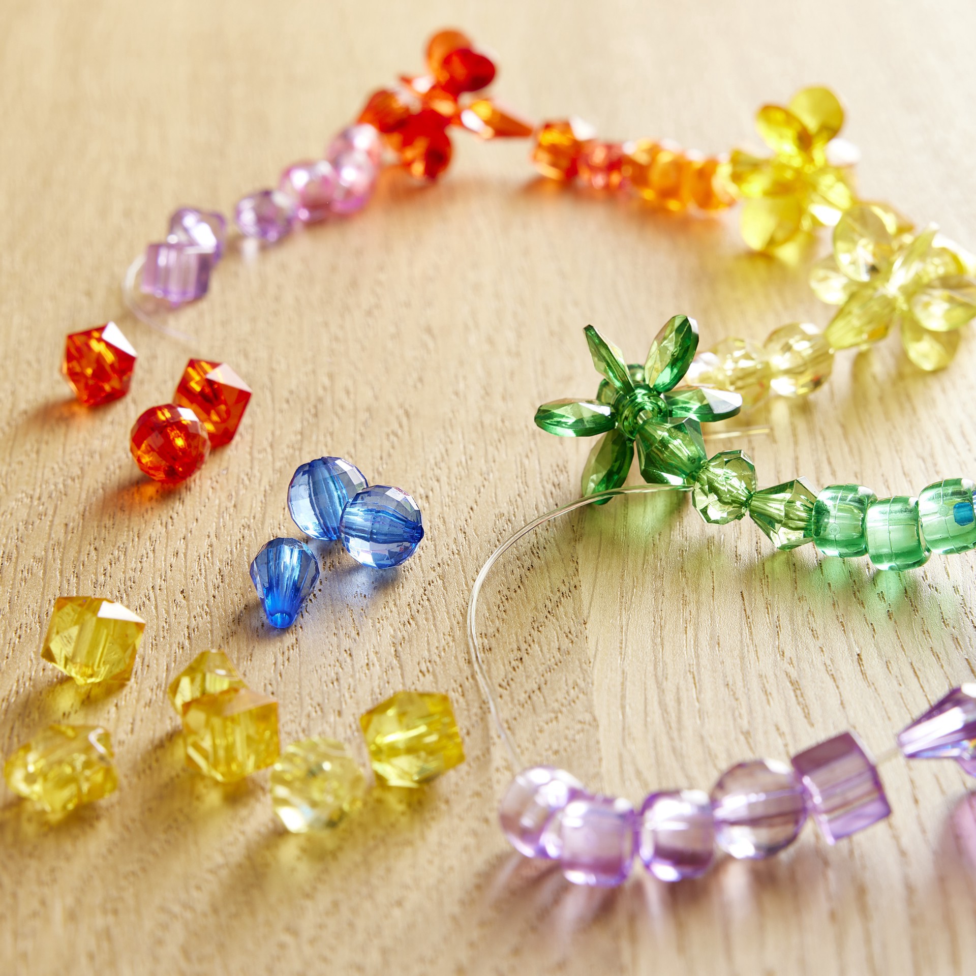 slide 4 of 4, Rainbow Mixed Shape Faceted Beads By Creatology, 0.25 in x 0.37 in