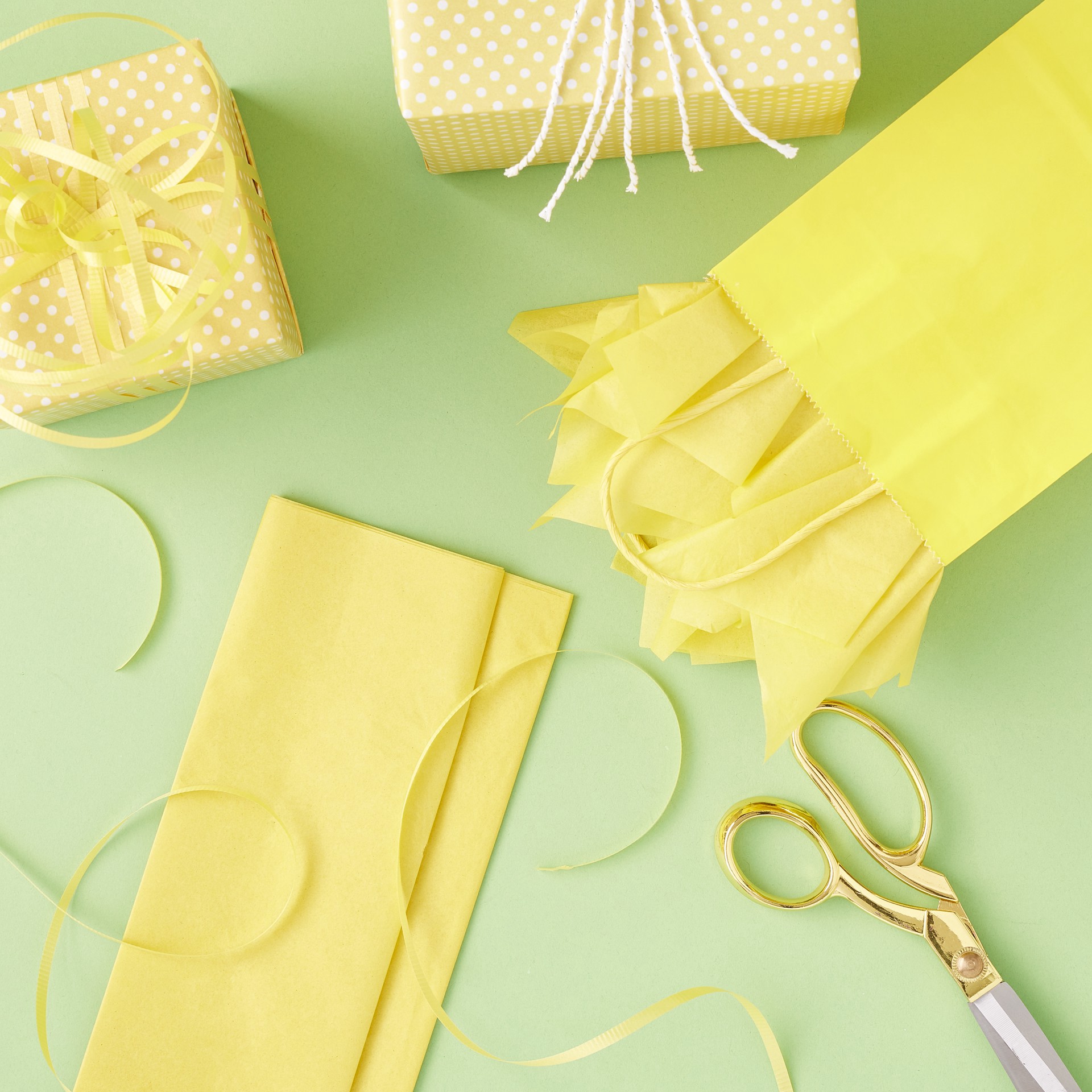 slide 2 of 3, Yellow Tissue Paper By Celebrate It, 12 Sheets, 20 in x 20 in