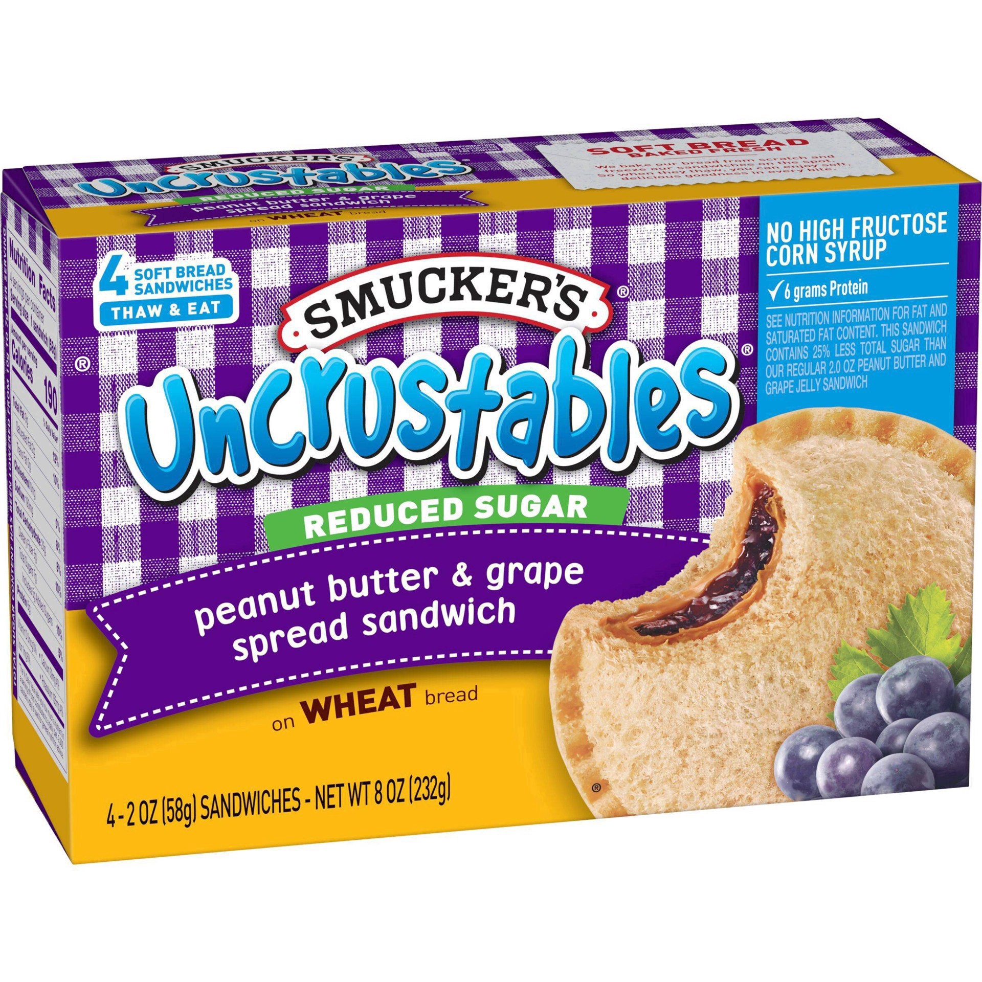 slide 6 of 26, Smucker's Uncrustables Frozen Whole Wheat Peanut Butter & Grape Jelly Sandwiches - 8oz/4ct, 