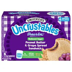 Smucker's Uncrustables Reduced Sugar Peanut Butter & Grape Spread Sandwich On Wheat Bread Pack 4 ea