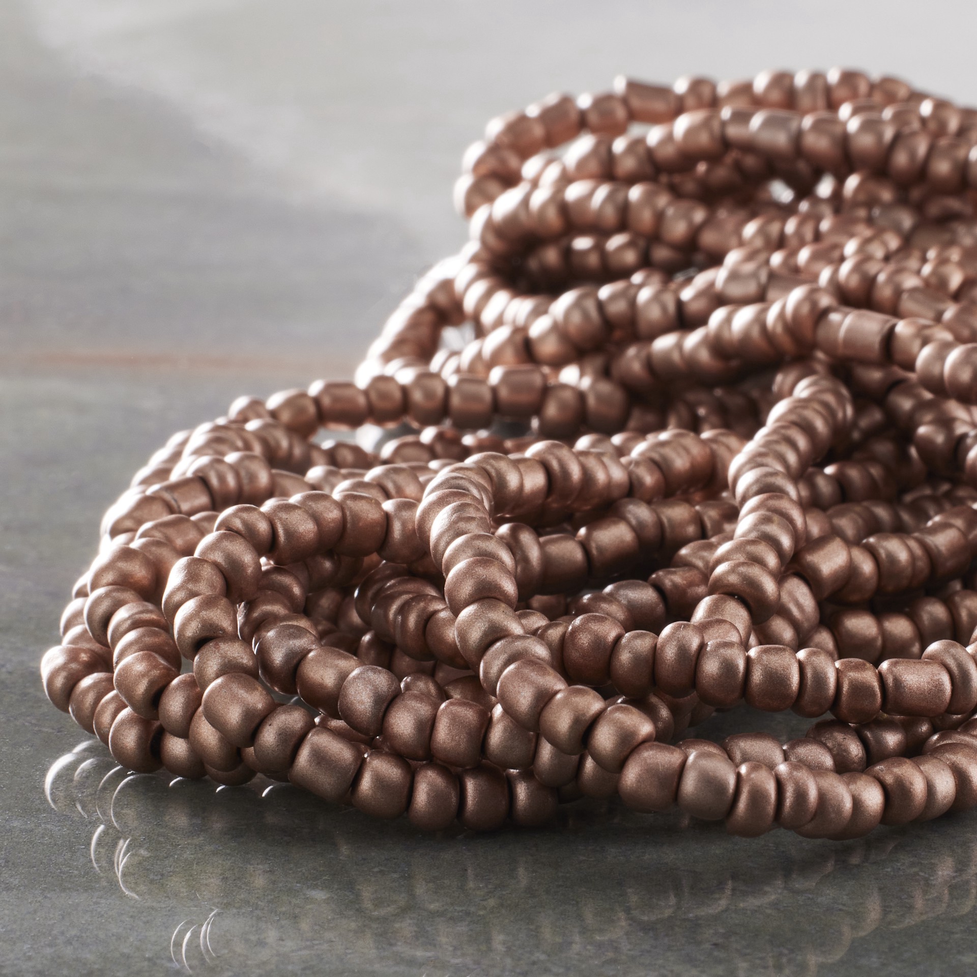 slide 3 of 3, Rose Gold Glass Seed Beads, 6/0 By Bead Landing, 6/0