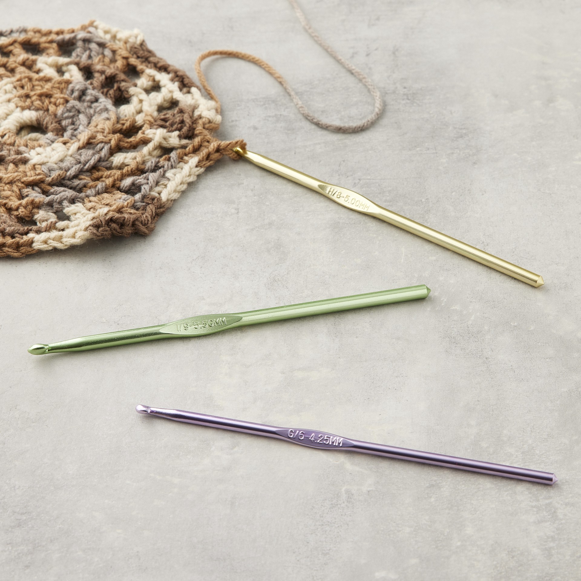 slide 2 of 3, Anodized Aluminum Crochet Hook Set By Loops & Threads, G-I, g/h/i | 4 ct; 5.5 mm