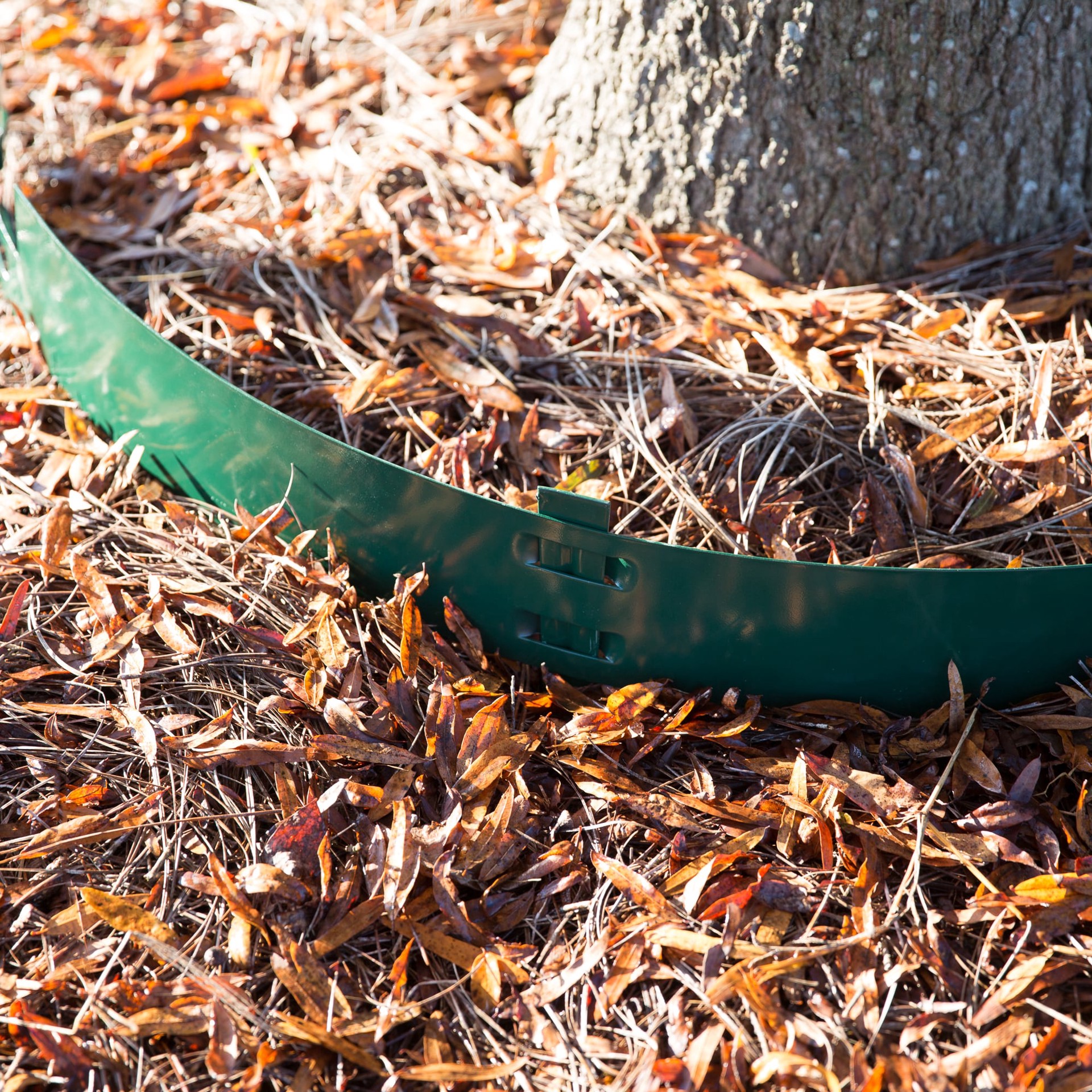 slide 2 of 6, Colmet 4 x 4-in Tree Ring Green Steel Landscape edging section with stakes, 1 ct