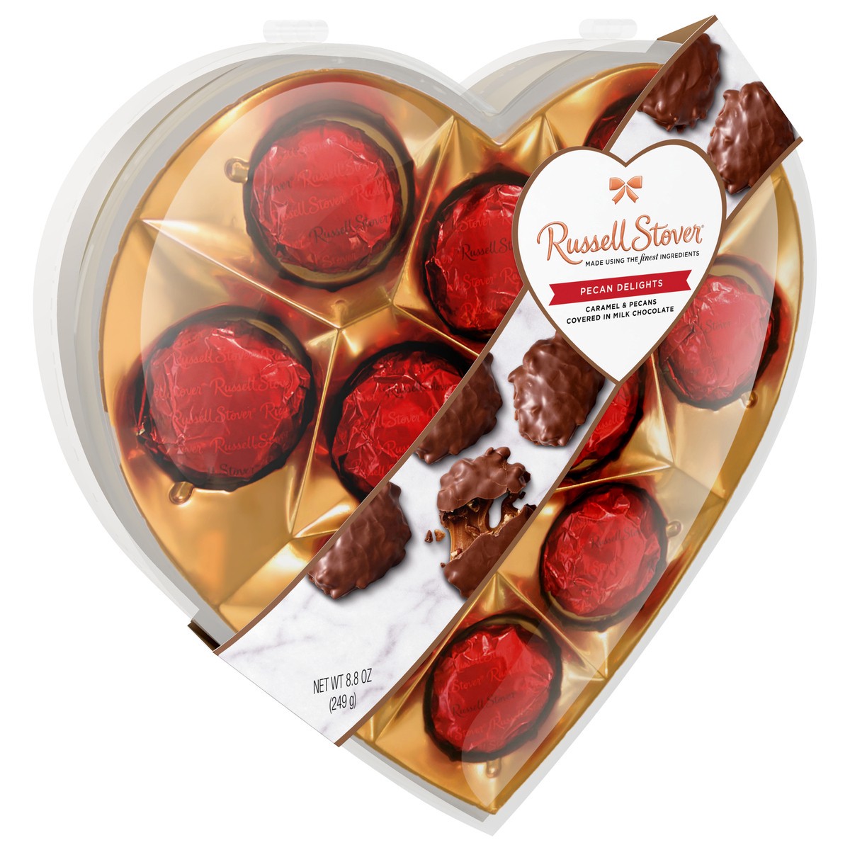 slide 4 of 4, Russell Stover Valentine's Day Clear Heart Pecan Delights Milk Chocolate Gift Box, 8.8 oz. (˜ 10 pieces), 7.2 oz