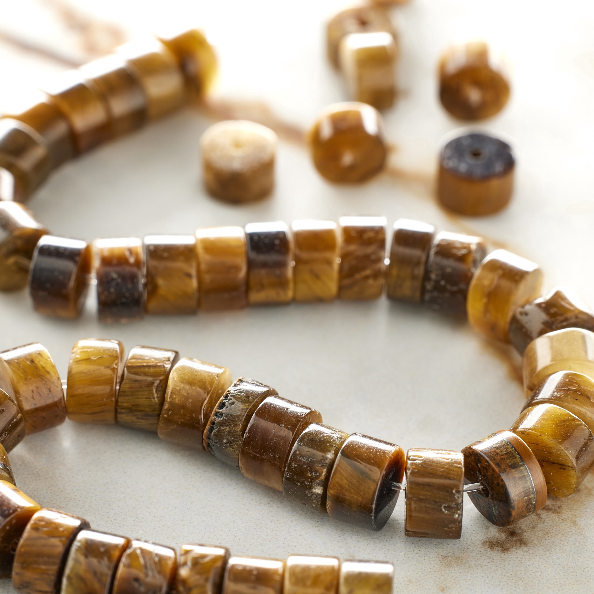 slide 2 of 3, Yellow Tiger Eye Round Heishi Beads By Bead Landing, 6mm, 6 mm