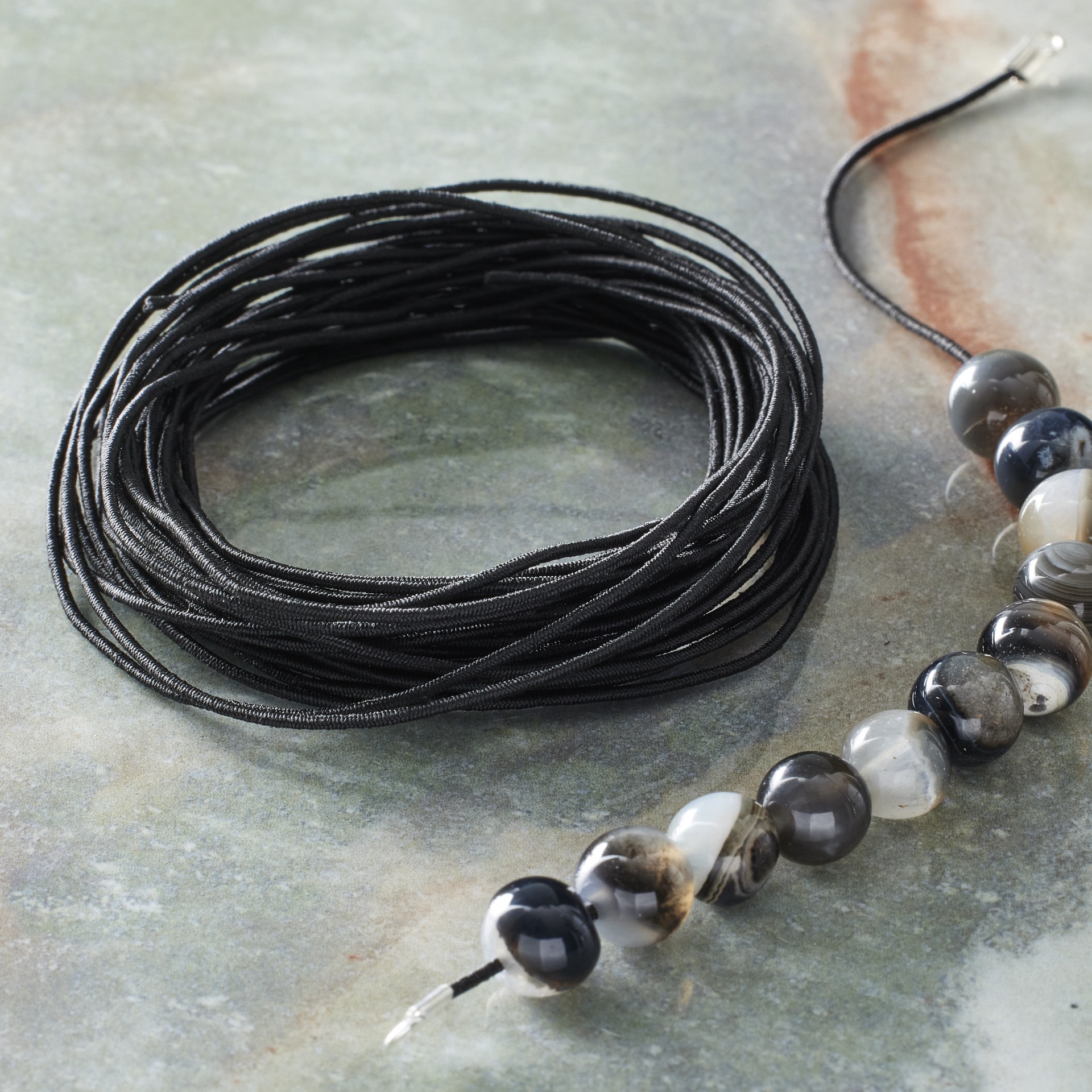 slide 3 of 3, 1mm Black Stringing Elastic Cord By Bead Landing, 1mm