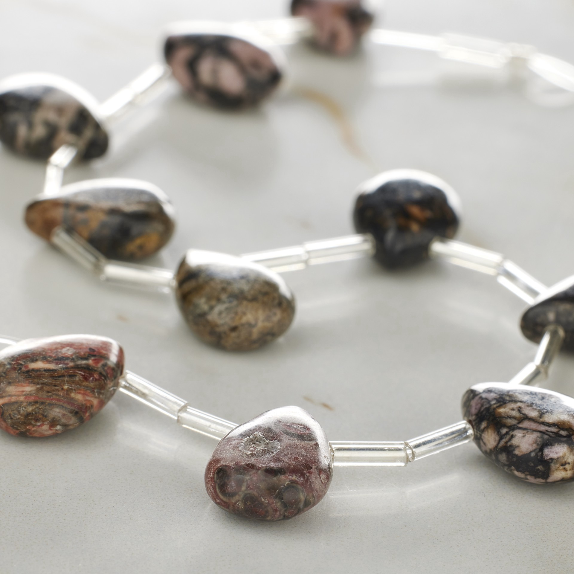 slide 2 of 3, Rhodonite Teardrop Beads By Bead Landing, 14mm, 14mm