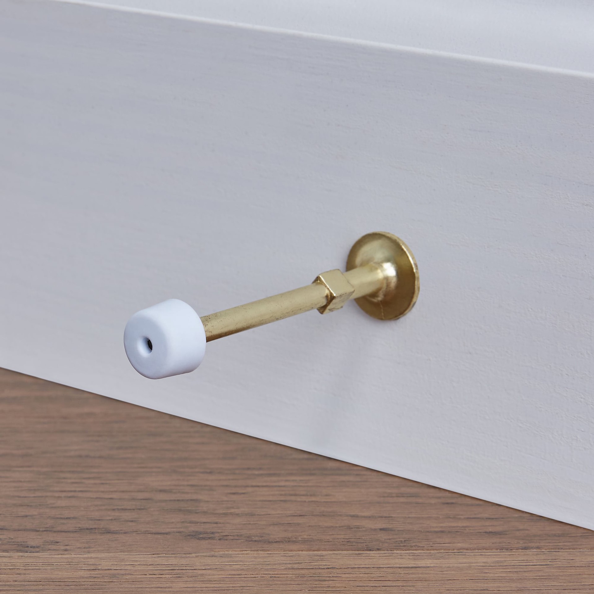 slide 3 of 6, RELIABILT 3-1/2-in Polished brass Rigid Door Stop, 1 ct