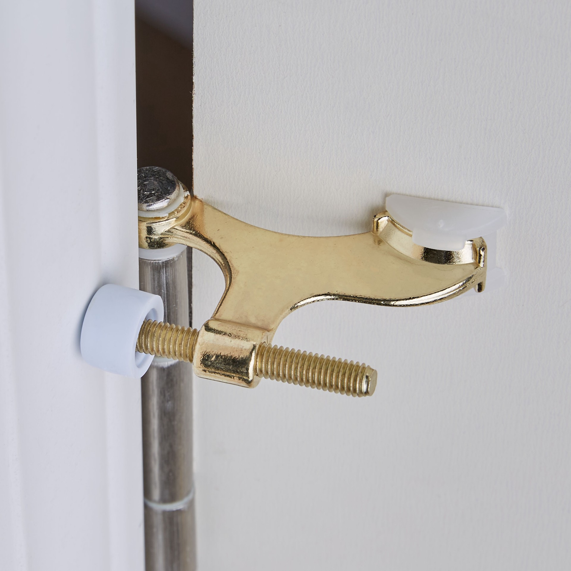 slide 3 of 6, RELIABILT 2-3/5-in Polished brass Hinge pin Door Stop, 1 ct