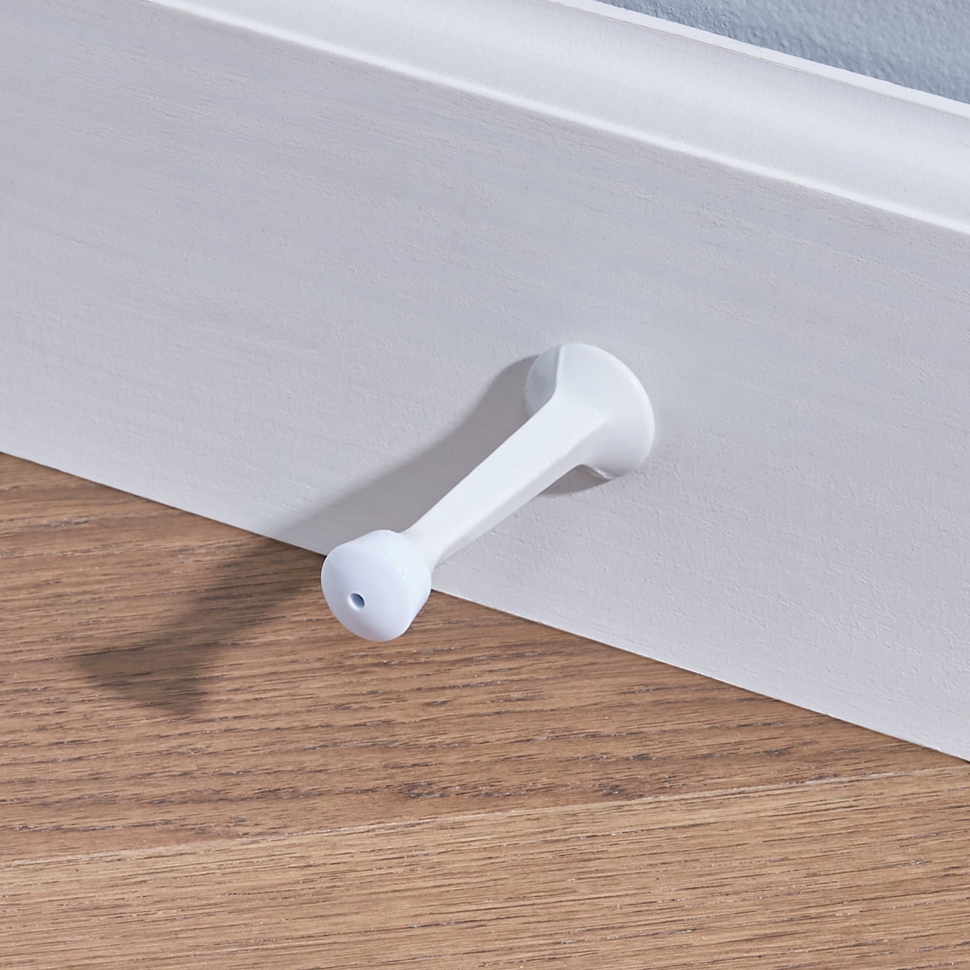 slide 3 of 6, RELIABILT 3-7/10-in White Rigid Door Stop, 1 ct