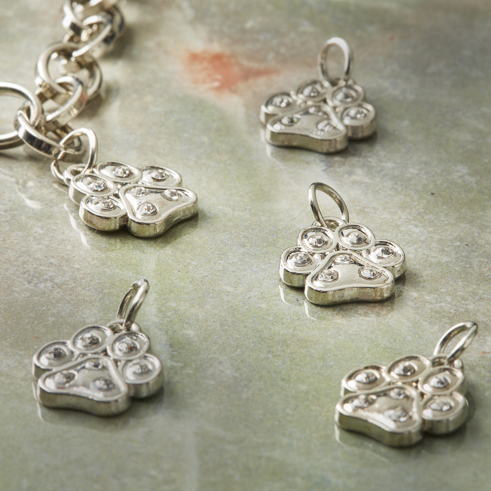 slide 2 of 3, Charmalong Rhodium Paw Charms By Bead Landing, 6mm x 15mm