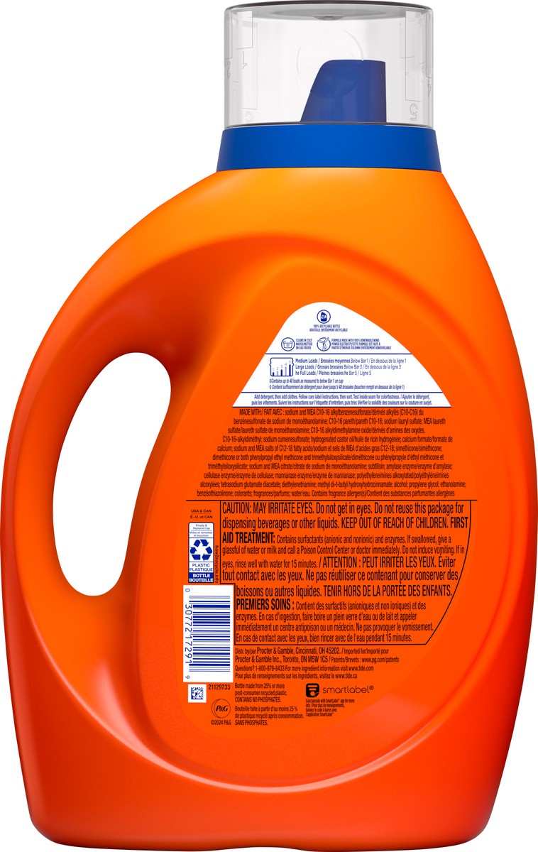 slide 2 of 8, Tide Laundry Detergent Liquid, Spring Meadow Scent, 48 Loads, 63 fl oz, Works on 100% of Common Stains, 63 fl oz