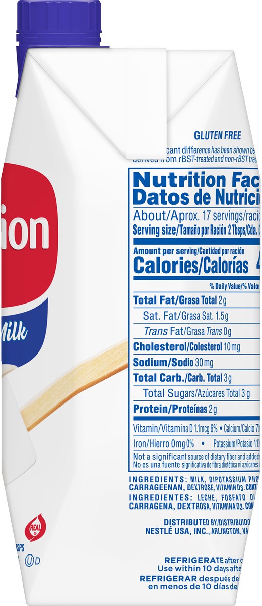 slide 9 of 13, Nestlé Milk, 17 fl oz