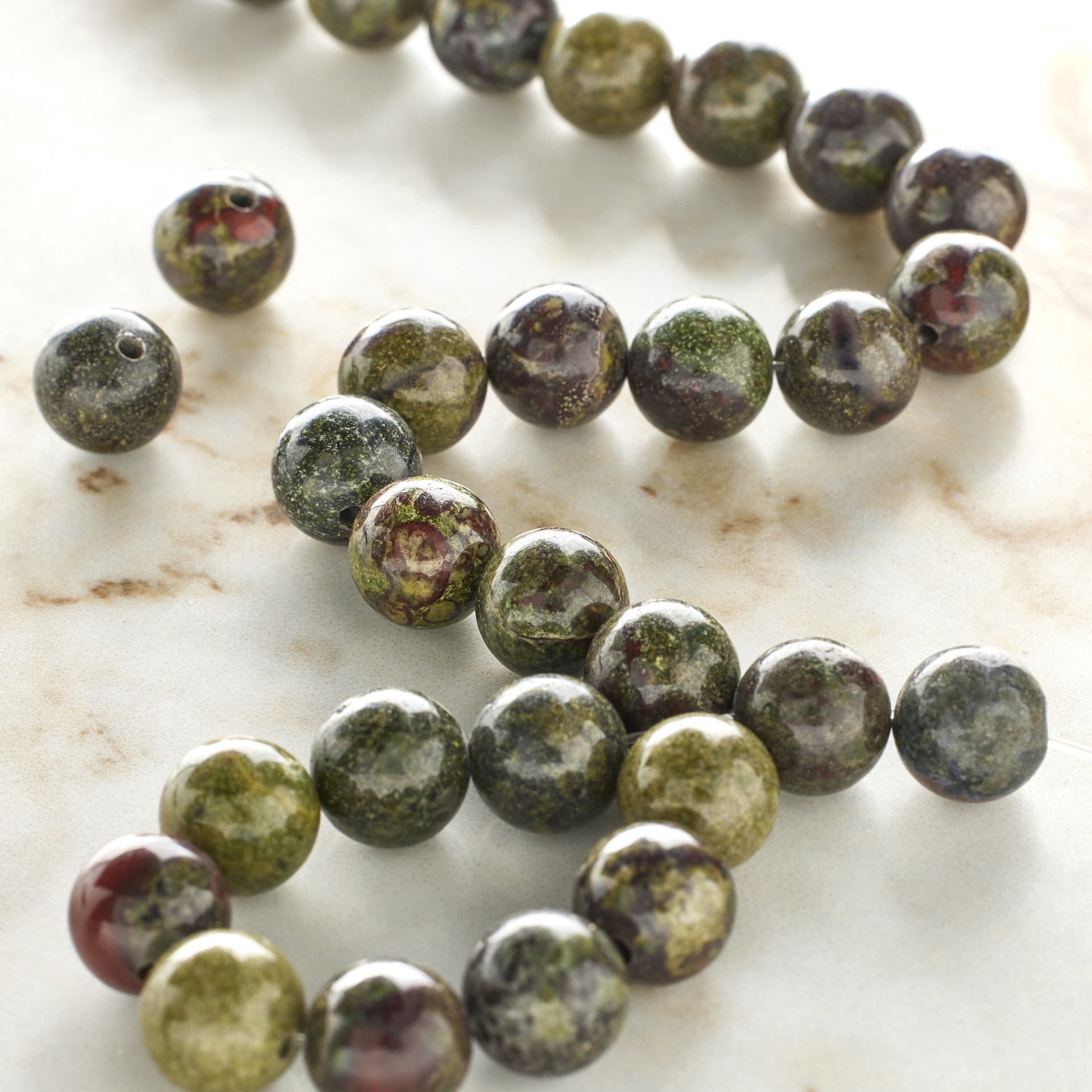 slide 2 of 3, Dragon Blood Jasper Round Beads, 8mm By Bead Landing, 8mm