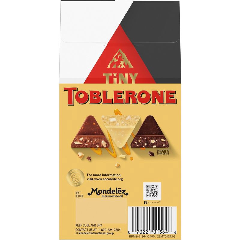 slide 10 of 15, TOBLERONE Tiny Assorted Chocolate Bars Variety Pack (Milk, Dark, & White), 1 Gift Bag (15 Pieces), 4.23 oz