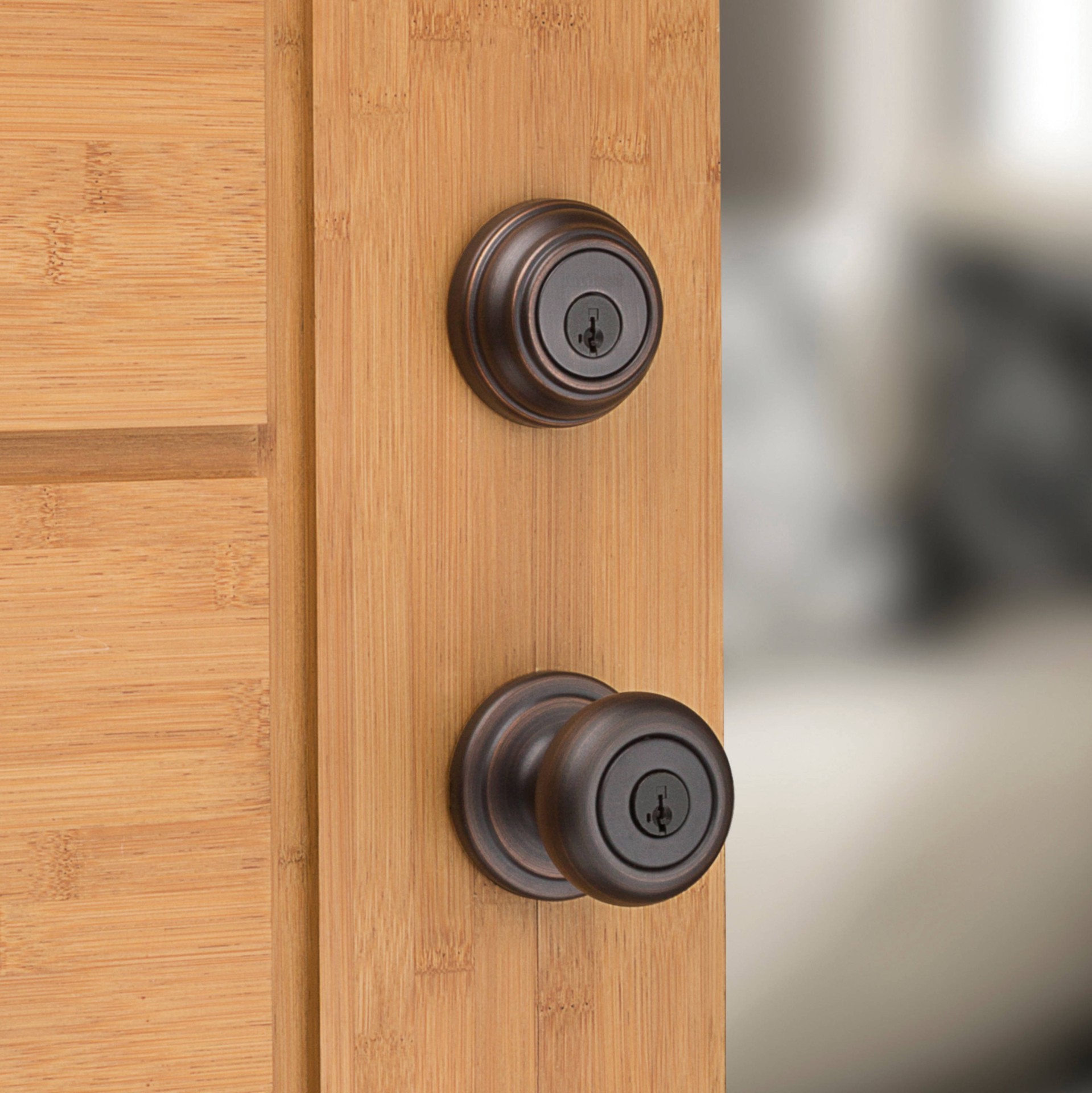 slide 5 of 6, Kwikset Signature Series Juno Venetian Bronze Exterior Double-Cylinder Deadbolt and Keyed Entry Door Knob Combo Pack ft. SmartKey Security, 1 ct