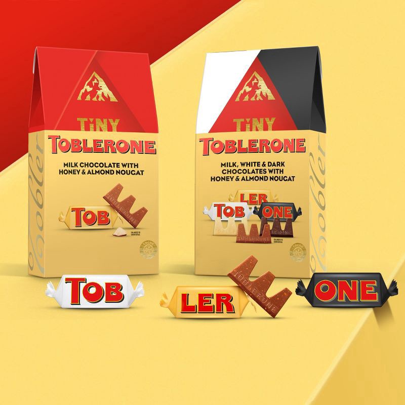 slide 6 of 14, TOBLERONE Tiny Milk Chocolate Bars with Honey and Almond Nougat, 1 Gift Bag (18 Pieces), 5.07 oz
