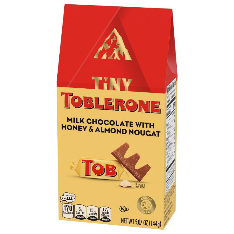 slide 8 of 14, TOBLERONE Tiny Milk Chocolate Bars with Honey and Almond Nougat, 1 Gift Bag (18 Pieces), 5.07 oz