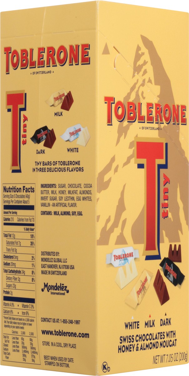 slide 2 of 7, Toblerone Tiny Swiss Chocolate Candy Bars with Honey & Almond Nougat Variety Pack, White, Dark and Milk Chocolate, 7.05 oz Gift Box, 0.44 lb