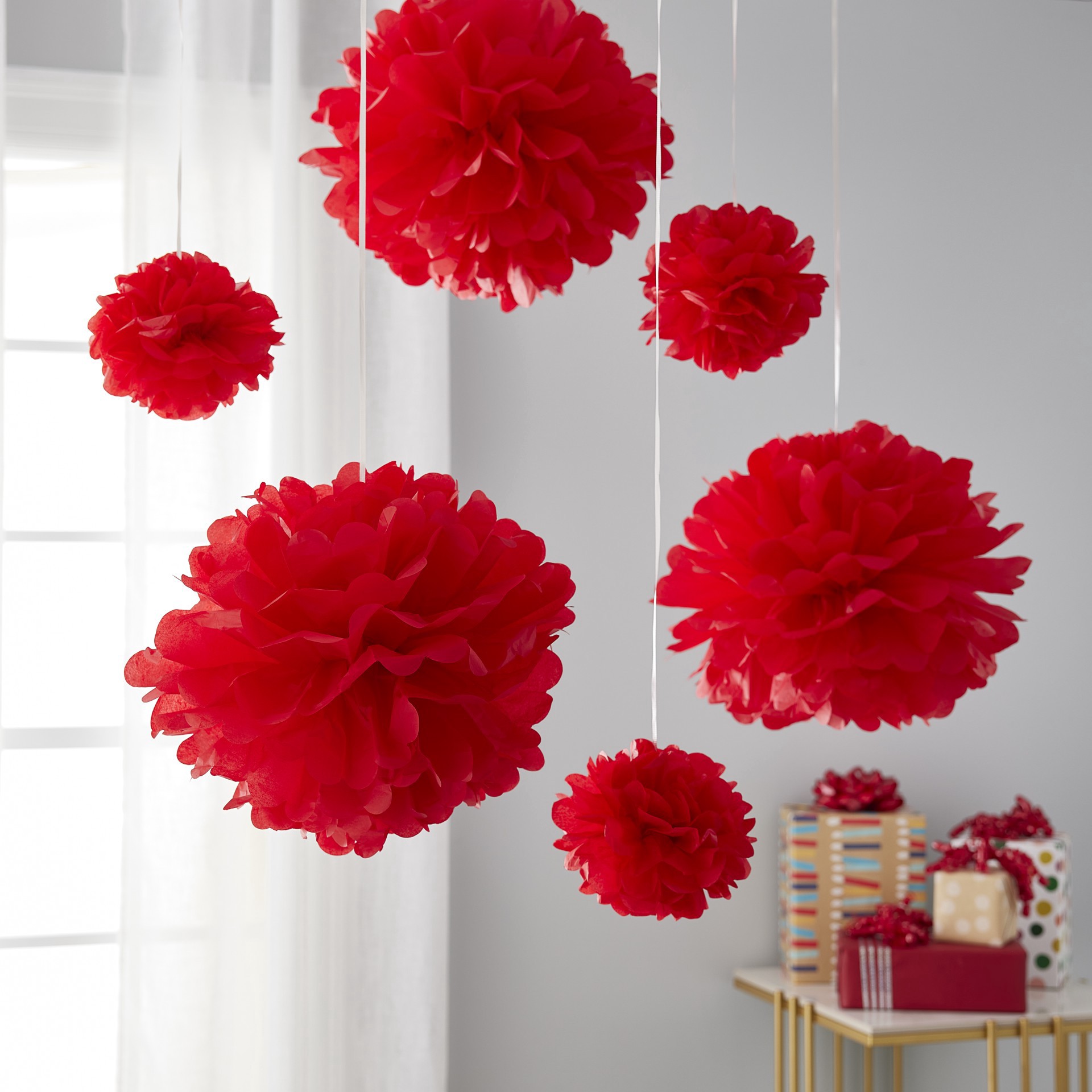 slide 2 of 6, Red Paper Pom Poms By Celebrate It, 10 in x 6 in package size