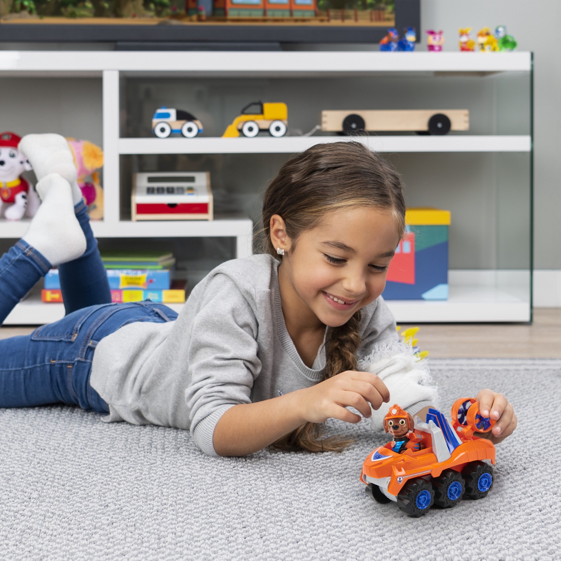 slide 2 of 5, PAW Patrol, Dino Rescue Zuma''s Deluxe Rev Up Vehicle with Mystery Dinosaur Figure, 1 ct