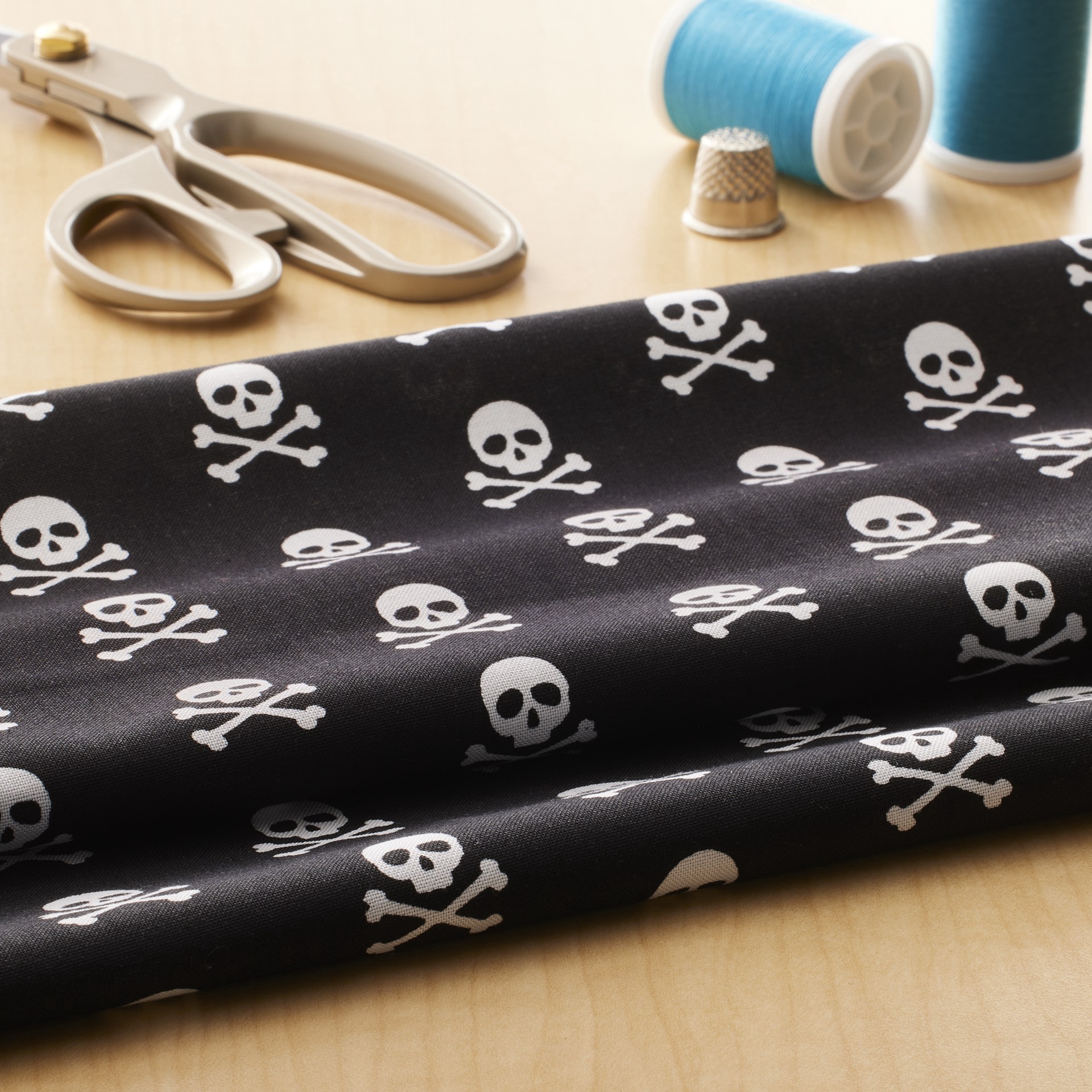 slide 2 of 3, Black Skull Fabric By Loops & Threads, 18 in x 21 in