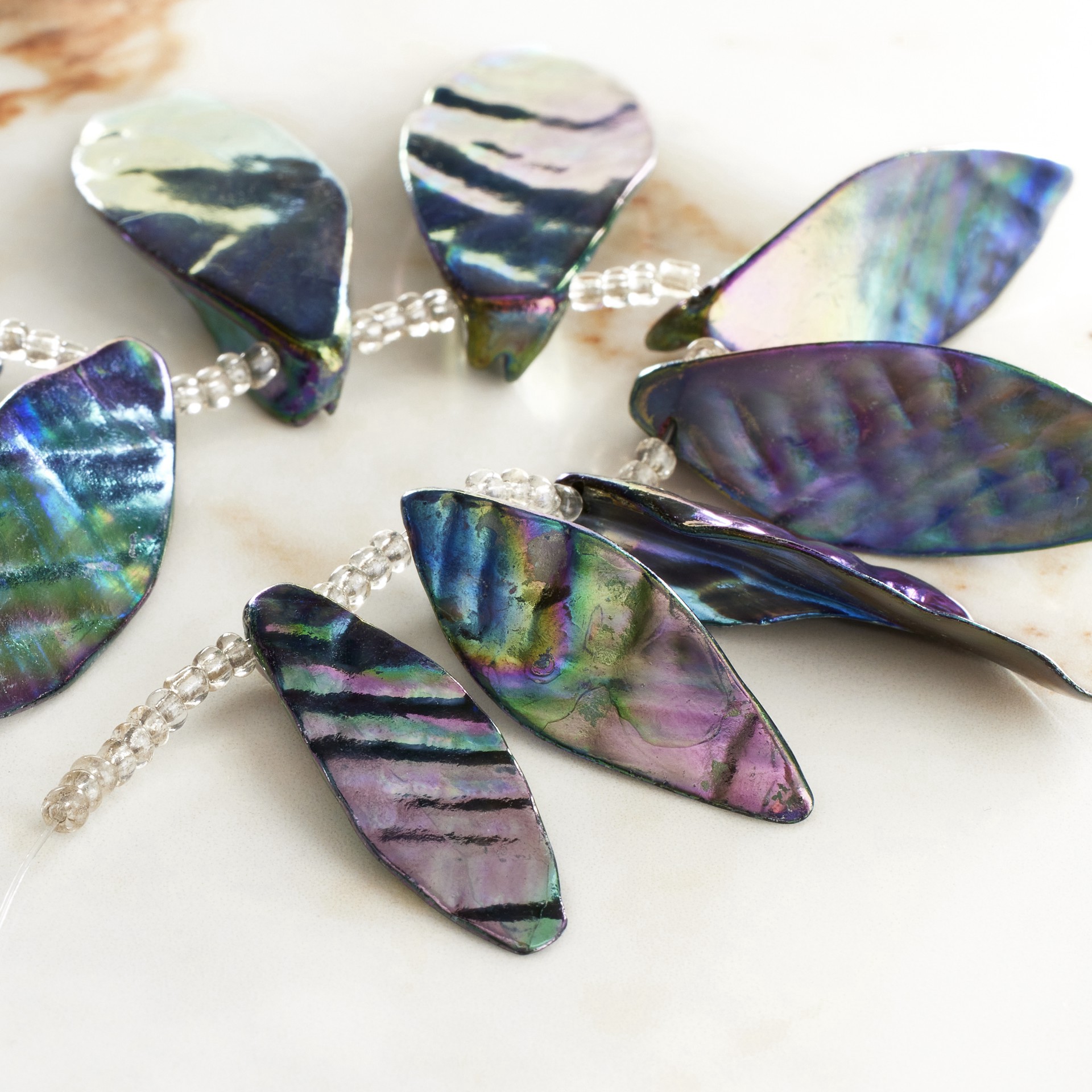 slide 2 of 3, Aurora Borealis Shell Leaf Beads By Bead Landing, 40 mm