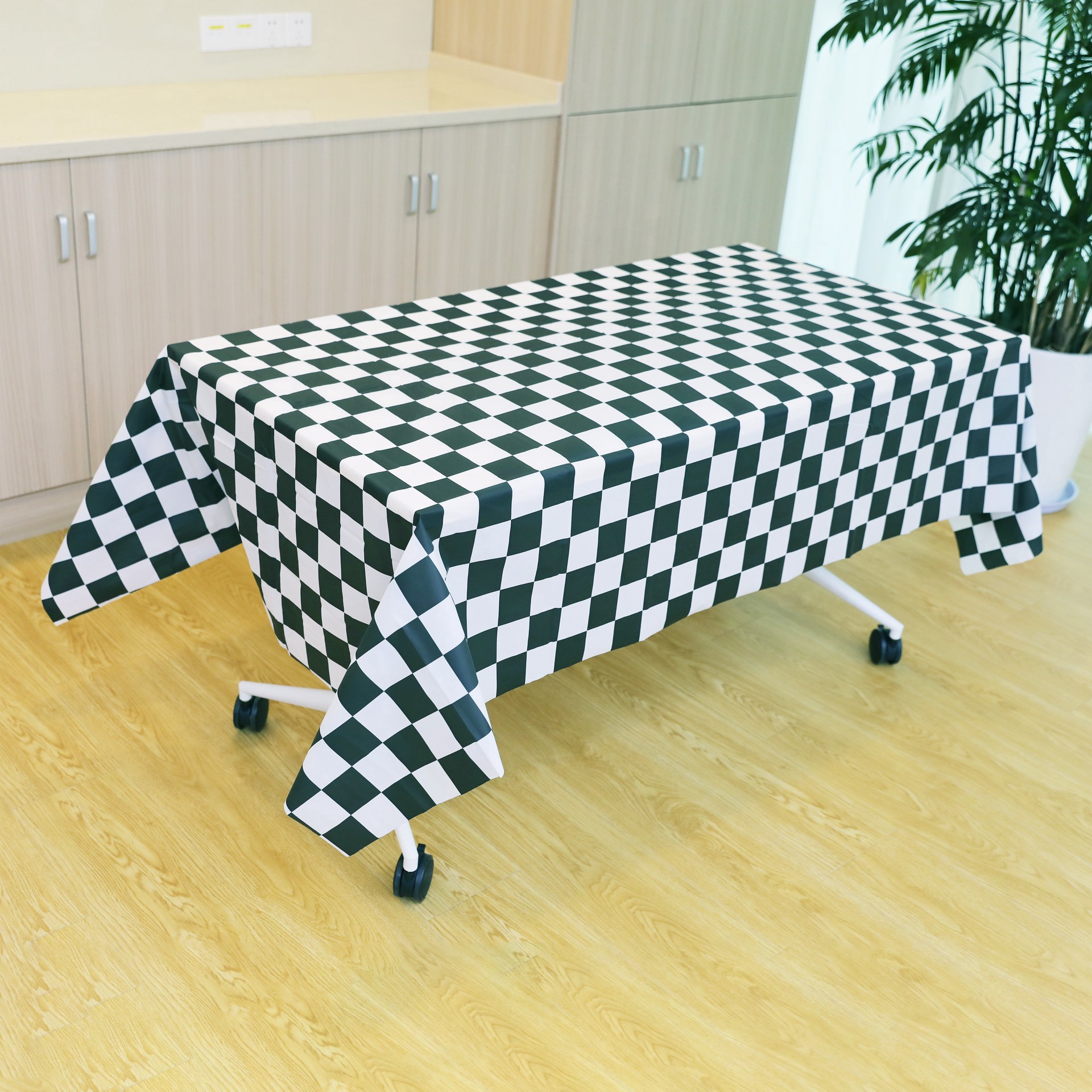 slide 3 of 3, 54" X 108" Black & White Checker Plastic Table Cover By Celebrate It, 54 in x 108 in