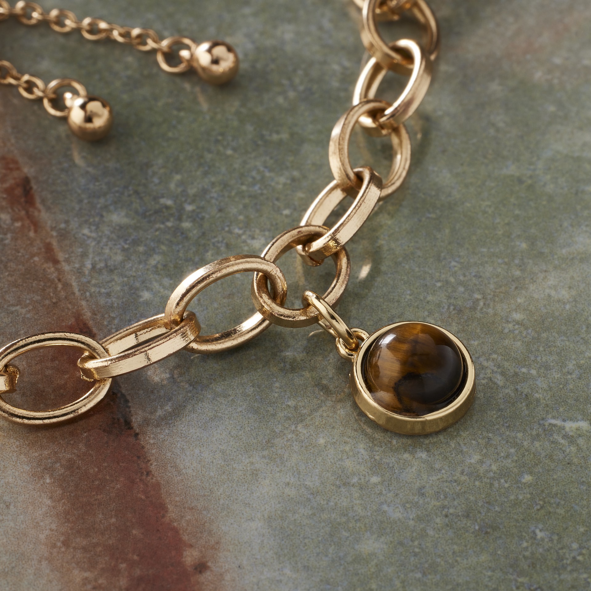 slide 3 of 3, Round Tiger's Eye Charm By Bead Landing, 10 mm charm diameter