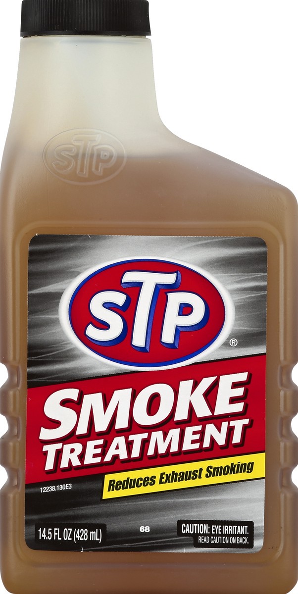 slide 2 of 2, STP Smoke Oil Treatment, 14.5 oz